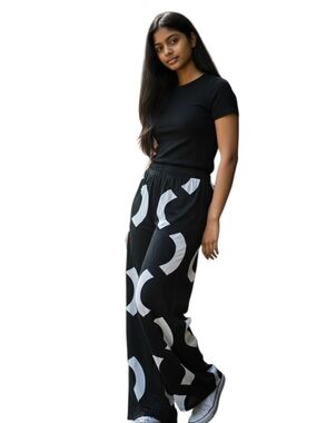 Black Pants with White Circular Graphic Accents
